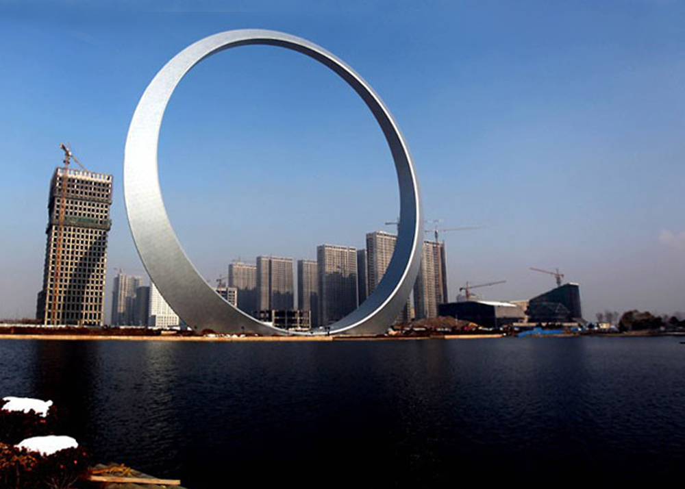 Кольцевое здание. Здание в форме кольца Китай Фушунь. Гуанчжоу круглое здание. Кольцо жизни в Фушуне. Шеньян город в Китае.
